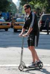 hugh-jackman-and-xootr-mg-with-fender-kick-scooter-gallery.jpg