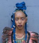 Mckensi, 19”I am wearing a feathered top from Doll’s Kill.jpg